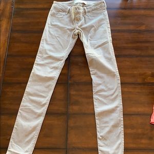 Tan Hollister skinny jeans